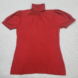 Red short sleeve knitt sweater with roll down neck . Small women's.